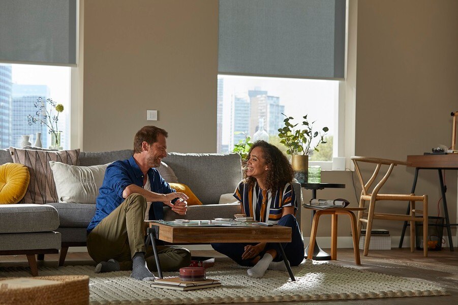 Man and Woman Playing Monopoly